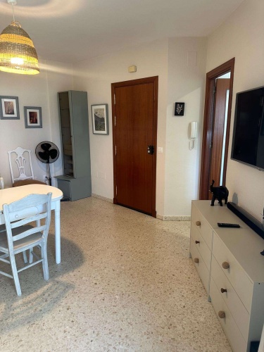 Apartamento Laguna de El Portil, alquiler temporada, piscina, pista de pádel, terraza acristalada, plaza de garaje

