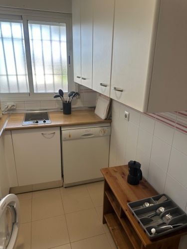 Apartamento Laguna de El Portil, alquiler temporada, piscina, pista de pádel, terraza acristalada, plaza de garaje

