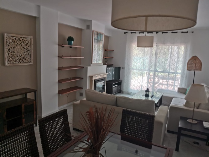 alquiler de temporada, casa adosada en Huelva, Playa del Portil, golf, piscina, alquiler vacacional, casa en la playa, Costa de la Luz, Cartaya, vivienda con terraza, estancias temporales

